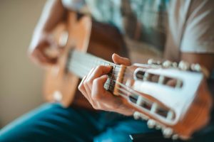 Analyzing the Techniques of Great Guitar Soloists